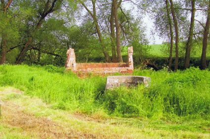 Pump House with Well in the foreground