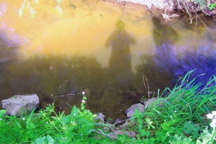 Point at which a weir used to exist running into a sluice feeding the Pum House